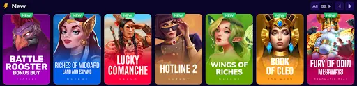 Sección “New” con una fila de tragamonedas nuevas marcadas como NEW, incluyendo Battle Rooster, Riches of Midgard, Lucky Comanche, Hotline 2, Wings of Riches, Book of Cleo y Fury of Odin Megaways